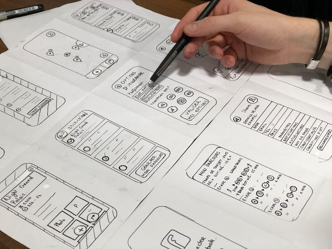 services-01 person-holding-pen-near-paper-sv8ooqaub-o